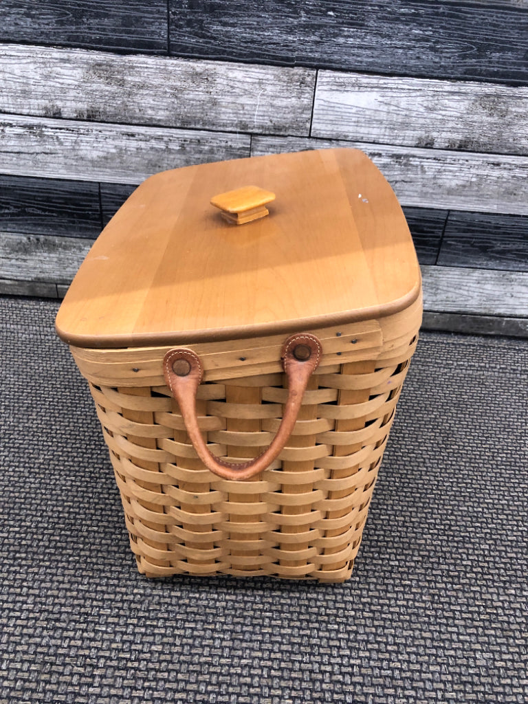 2013 LARGE SLANT BASKET  W/WOOD COVER, PLASTIC PROTECTOR, + LEATHER HANDLES.