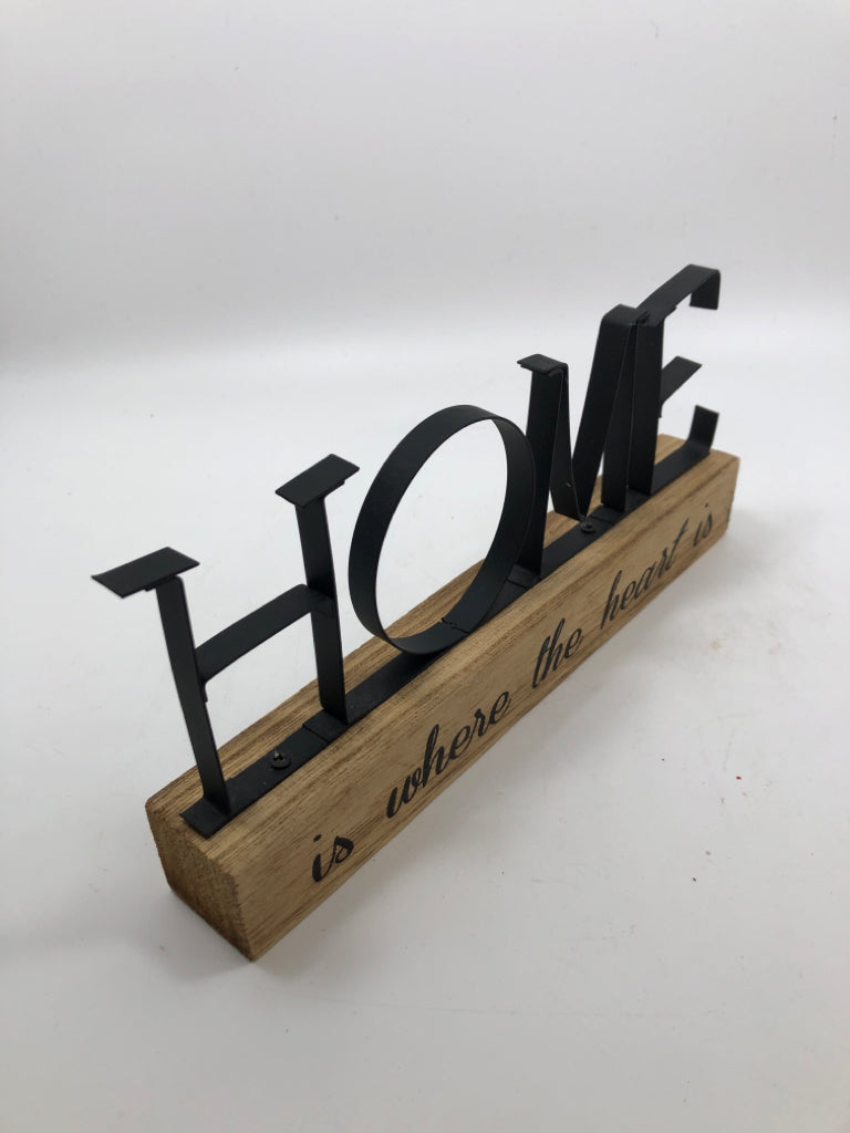 "HOME" METAL SIGN ON WOOD BLOCK.