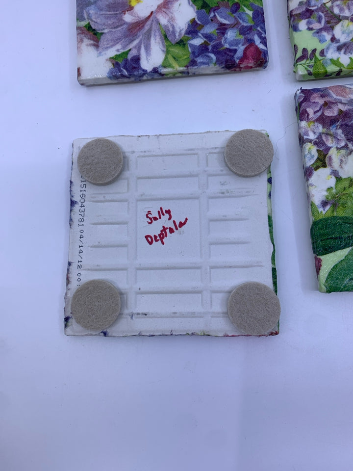 4 PINK FLORAL CERAMIC COASTERS.