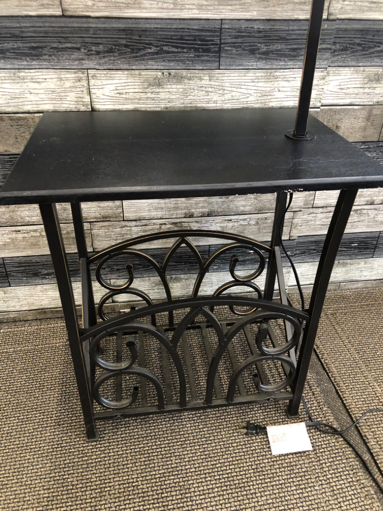 BLACK RECTANGLE SIDE TABLE W BOTTOM STORAGE AND ATTACHED LAMP.