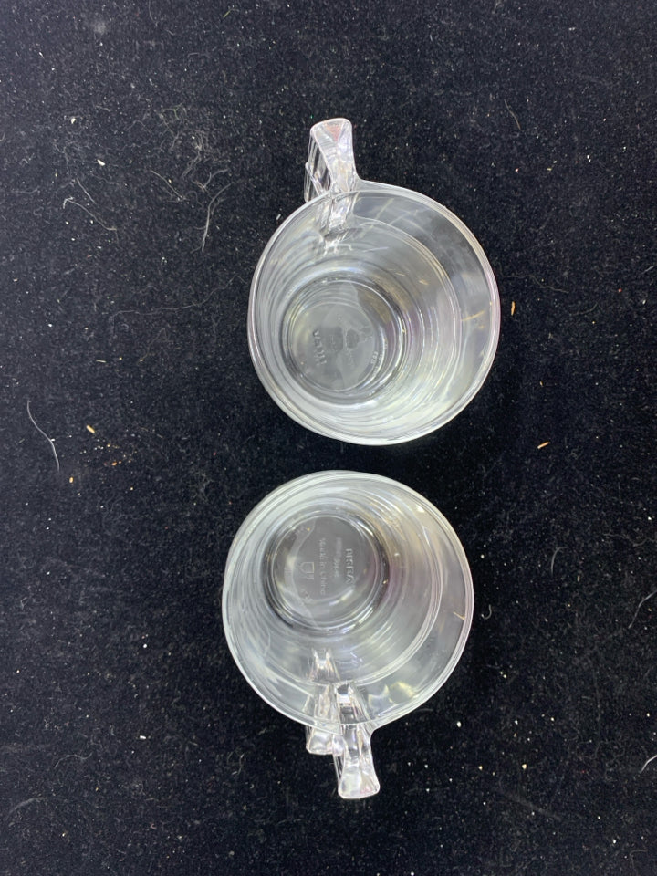 4 CLEAR GLASS MUGS.