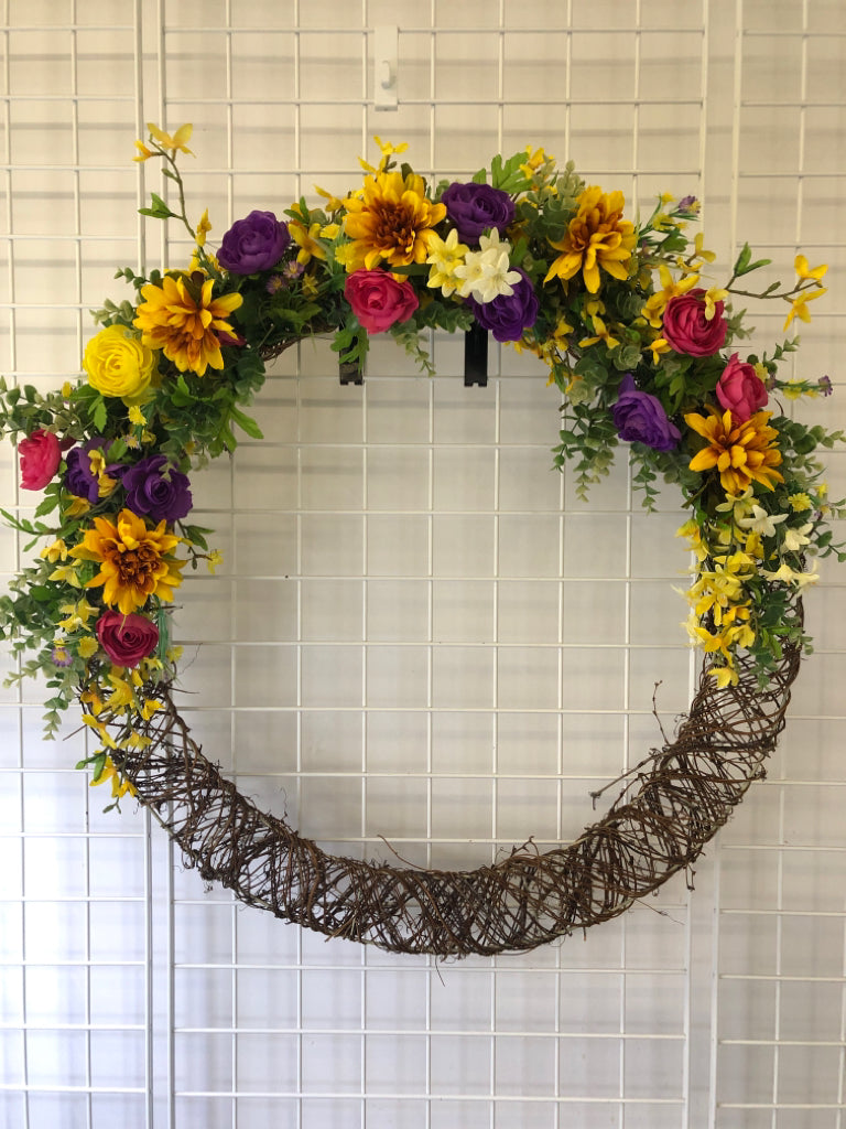 LARGE PINK YELLOW PURPLE FAUX FLORAL WREATH.