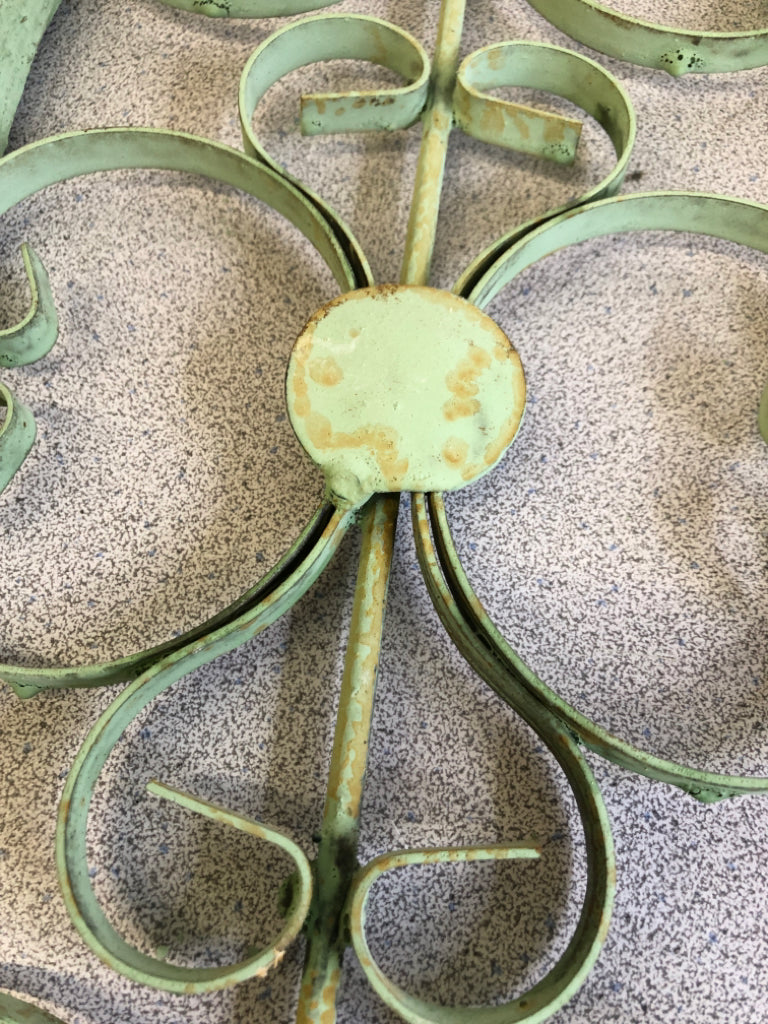 DISTRESSED GREEN PAINTED ARCH W/ METAL SCROLL WALL ART.
