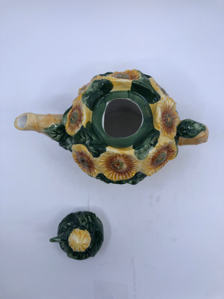 CERAMIC TEAPOT BASKET SHAPED W/ EMBOSSED SUNFLOWERS.