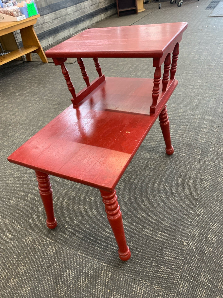 RED PAINTED END TALE WITH TOP SHELF.