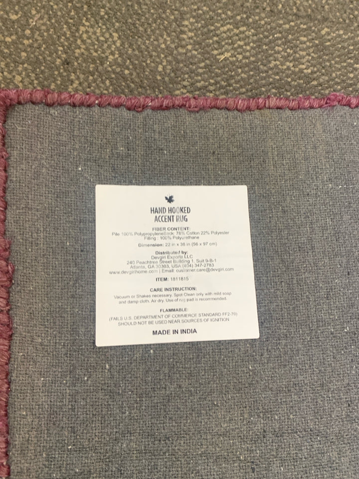 PURPLE WITCH BOOTS HAND HOOKED ACCENT RUG.