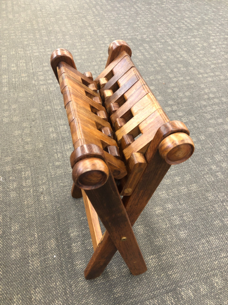 INTERLOCKING WOODEN SLAT FOLDING STOOL.