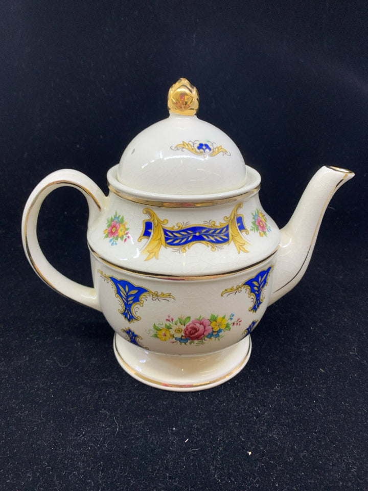 KENSINGTON ENGLAND TEAPOT= CREAM W/GOLD TRIM AND FLOWERS.