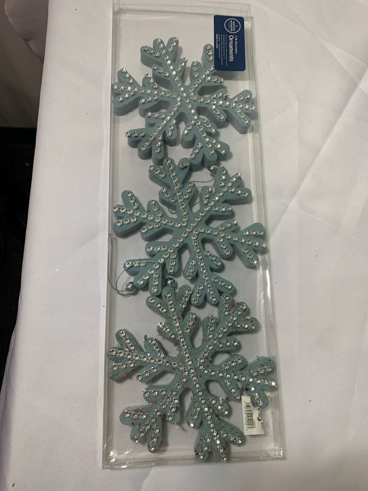 3 BLUE SNOWFLAKE ORNAMENTS.