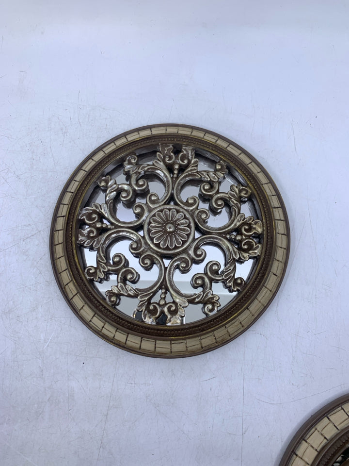 SMALL SILVER SCROLL W/ BROWN EDGE MIRROR.