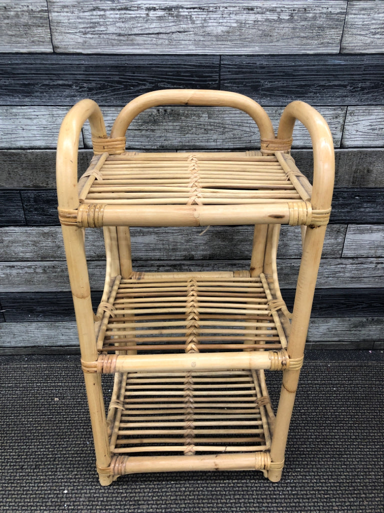 RATTAN STORAGE SHELF.