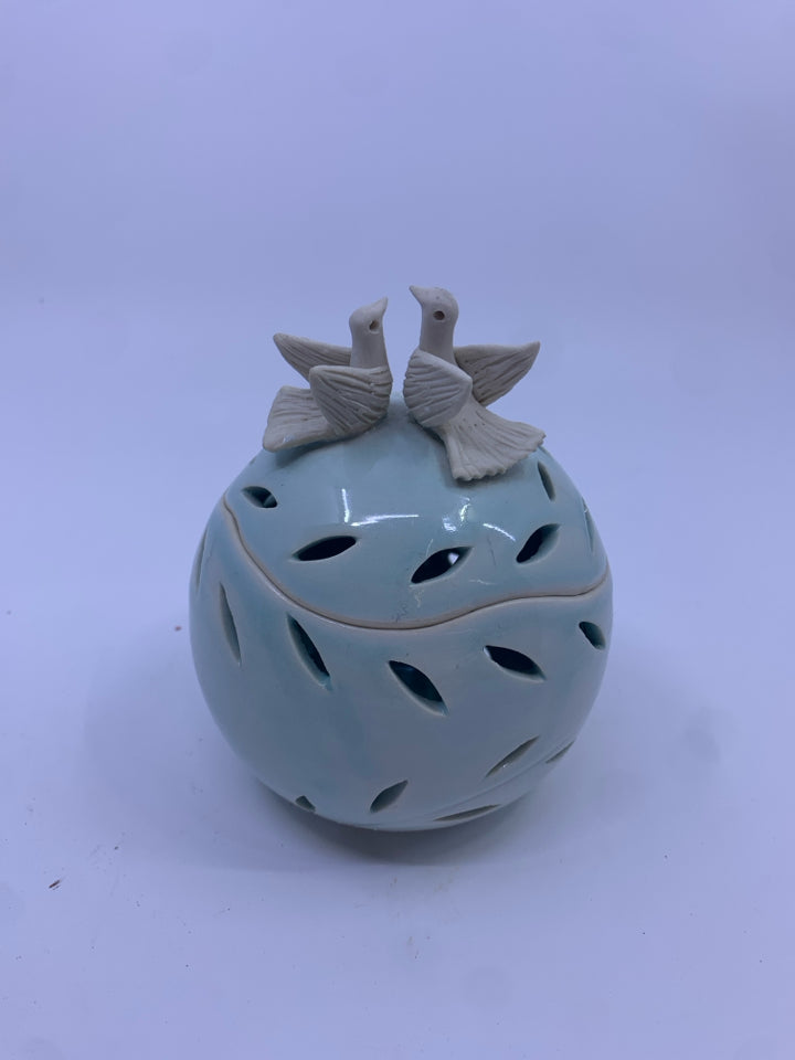 LIGHT BLUE PIERCED CANISTER W/ DOVES IN TOP.