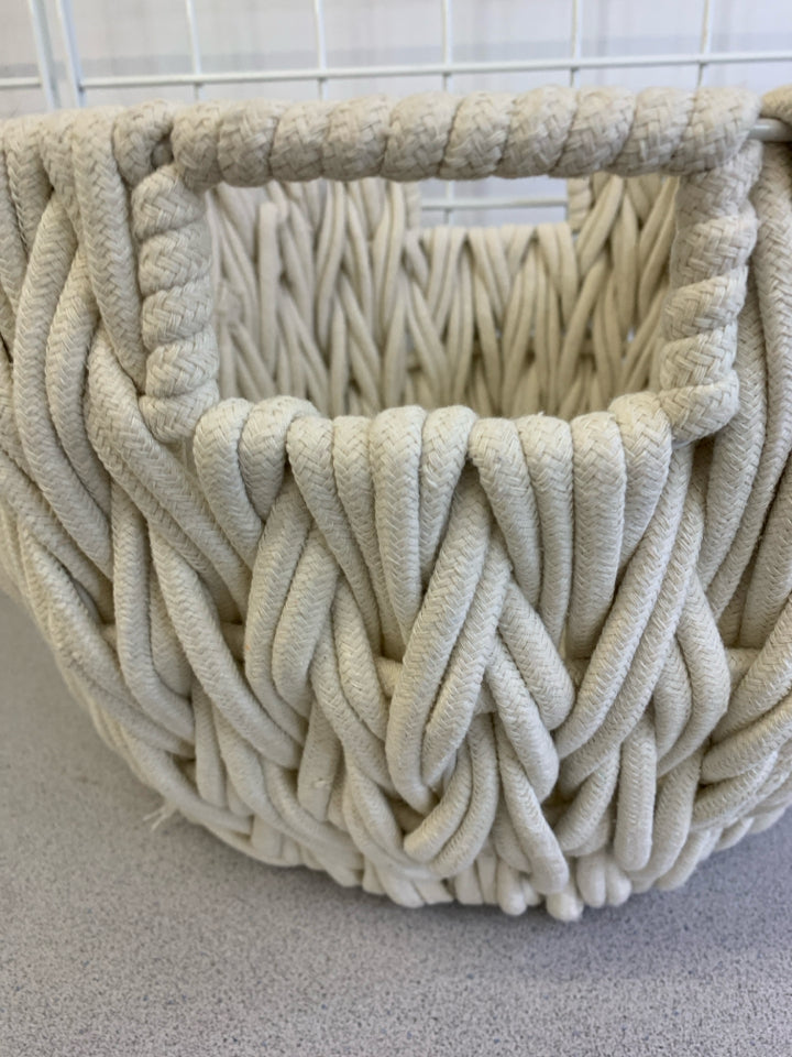 WHITE MACRAME ROUND STORAGE BIN.