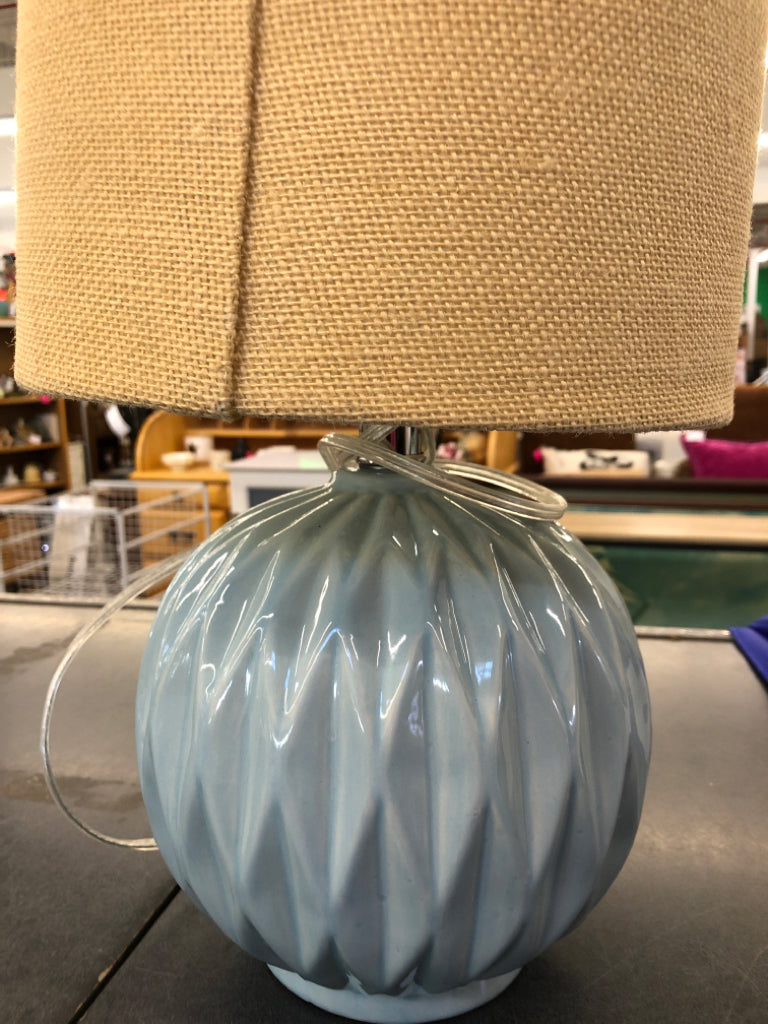 ROUND TEAL LAMP W TAN SHADE.