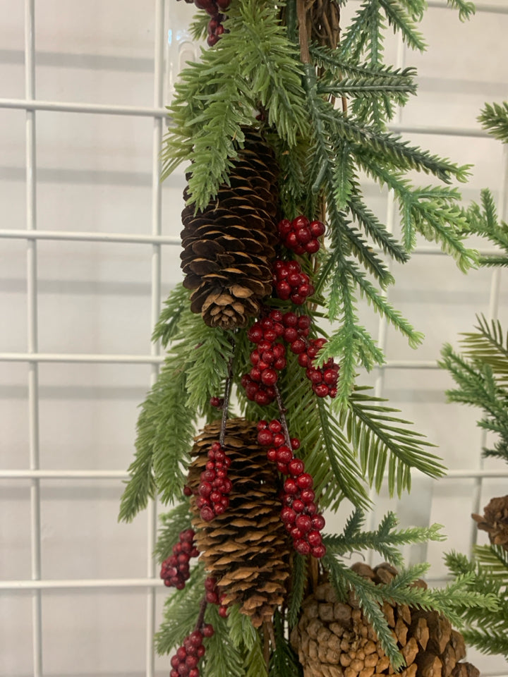 PINECONES AND RED PIP BERRY GARLAND.