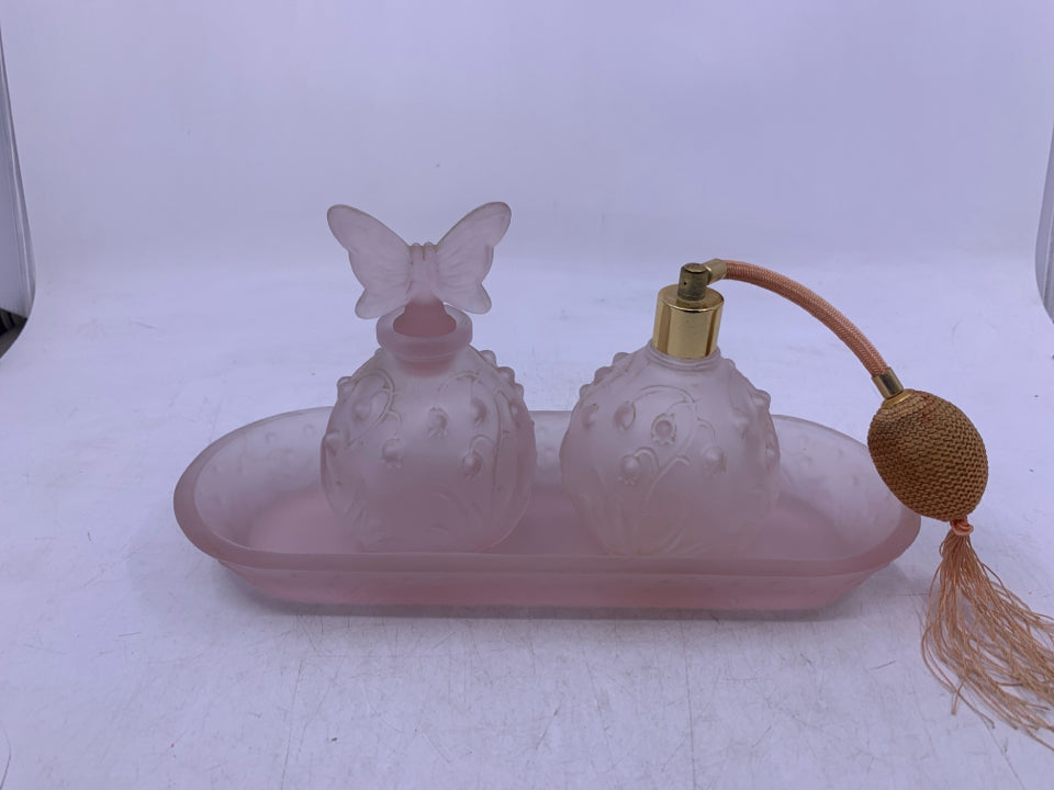 3 PC FROSTED PINK GLASS W/ EMBOSSED FLOWERS 2 PERFUME BOTTLES ON OVAL TRAY.