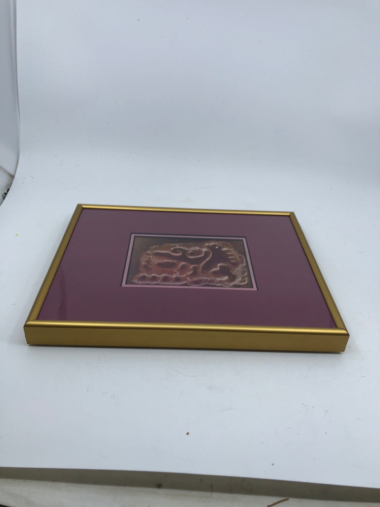 GOLD FRAME W/ MAROON BACKGROUND ABSTRACT DESIGN WALL ART.