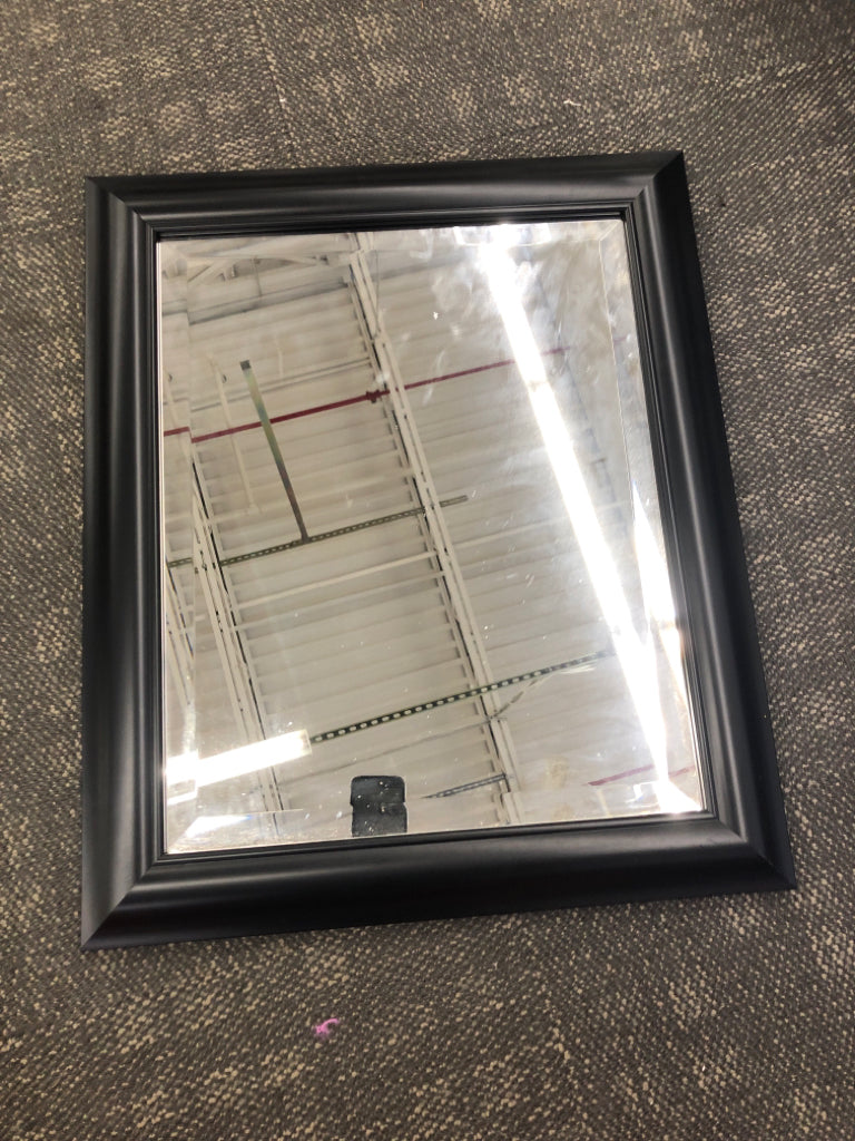 MIRROR W/BLACK FRAME.