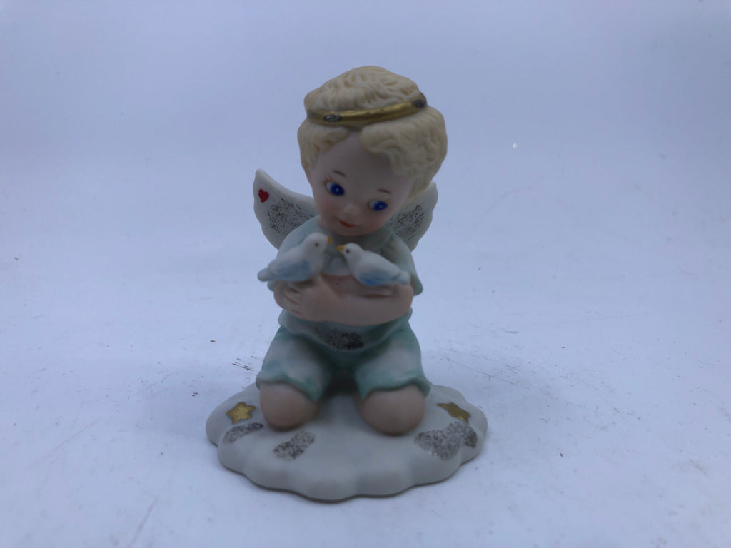 CHERUB HOLDING BIRDS.