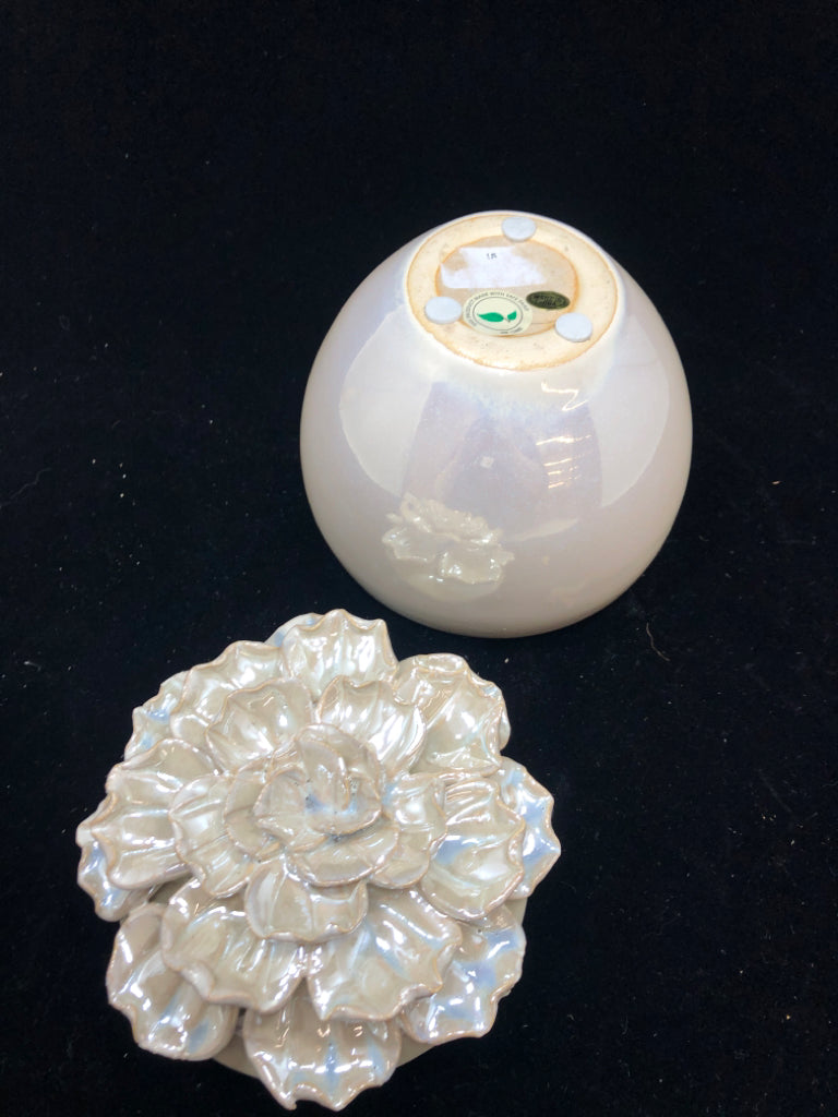 IRIDESCENT CERAMIC JAR W/FLOWER LID.