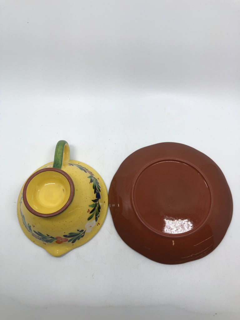 FLORAL PAINTED FOOTED BOWL W/HANDLE ON DRIP PLATE.