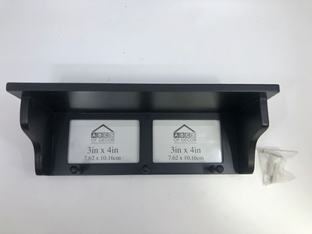 NIB BLACK PHOTO WALL SHELF WITH PEGS.