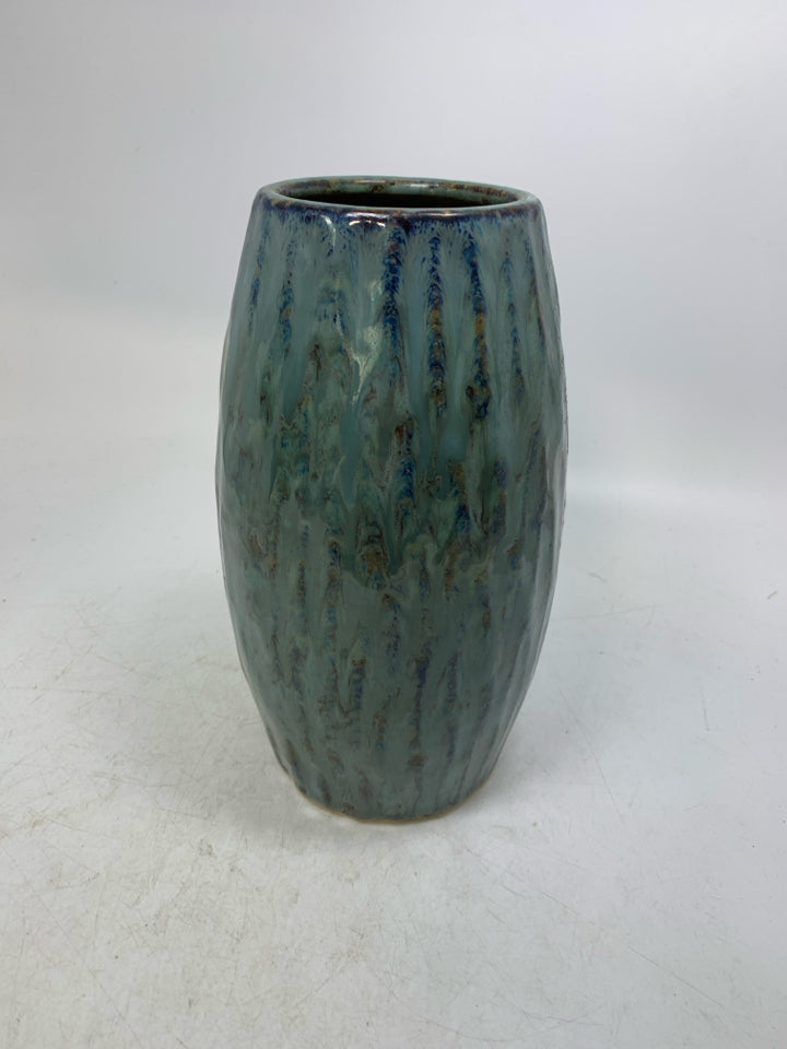 TEXTURED PALE BLUE CERAMIC VASE.