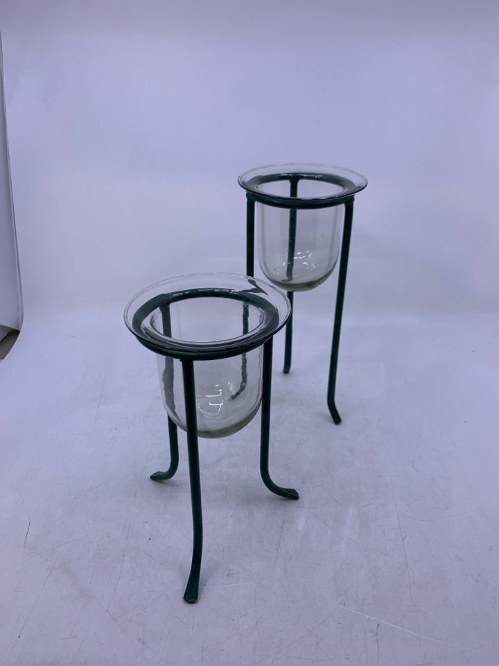 2 GREEN METAL STANDS W/ GLASS INSERTS.