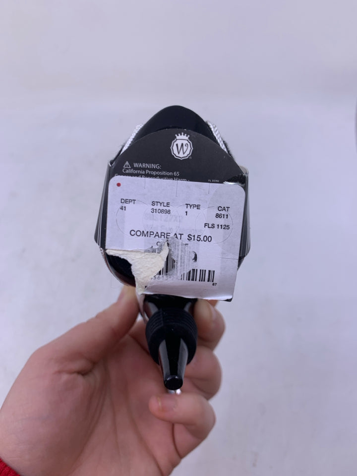 RESIN HIGH HEEL WHINE STOPPER.