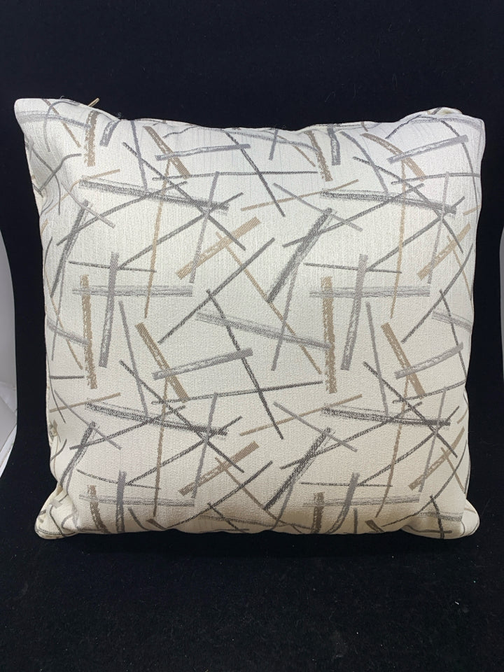 CREAM PILLOW W/GOLD, SILVER LINES.