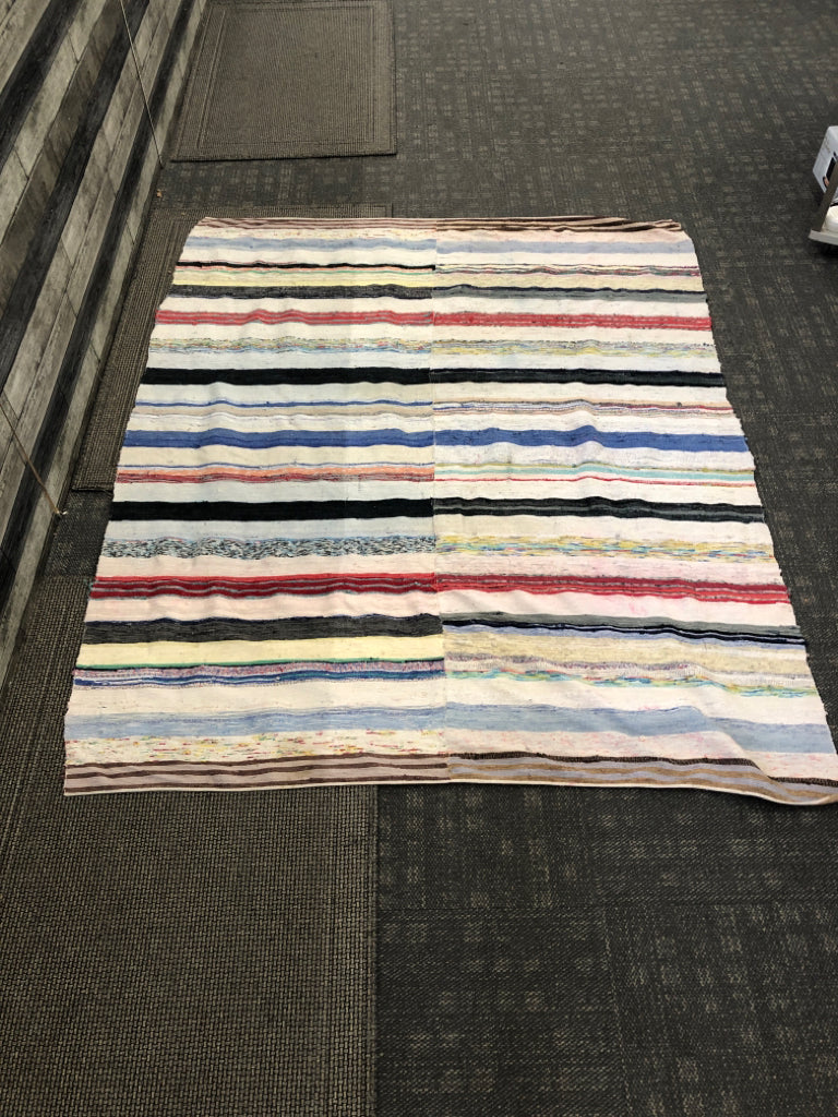 MULTICOLORED STRIPE RUG.