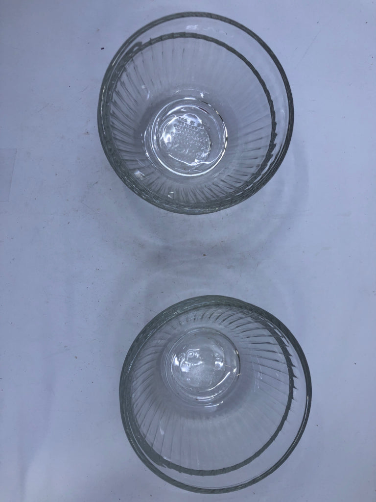 4 RIBBED PYREX BOWLS.