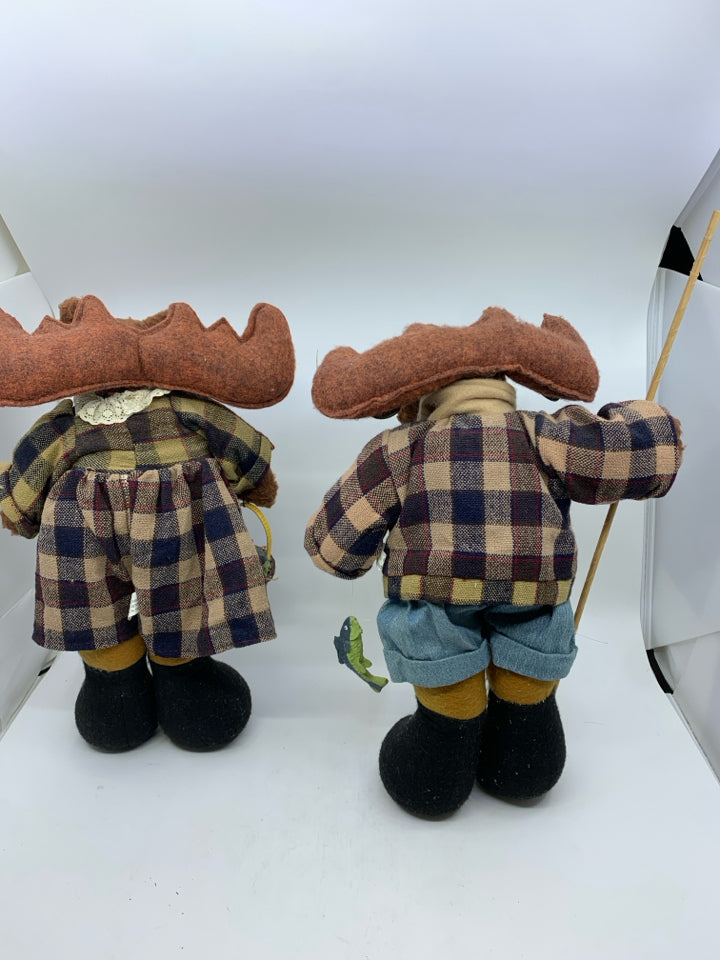 2 PLUSH MOOSE IN PLAID ON HOLDING FISHING GEAR HEAVY FEET.