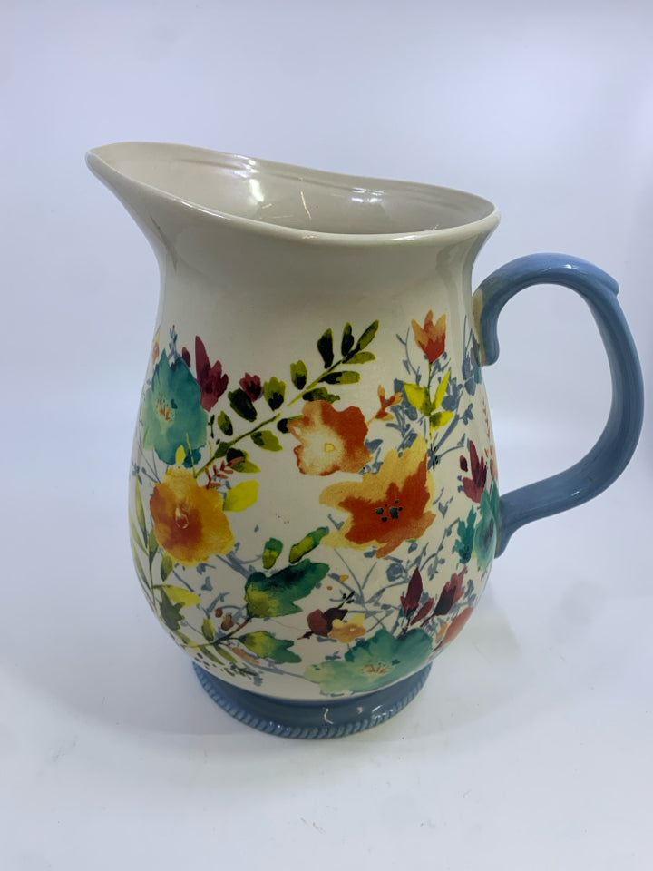 FLORAL PITCHER W/BLUE HANDLE.