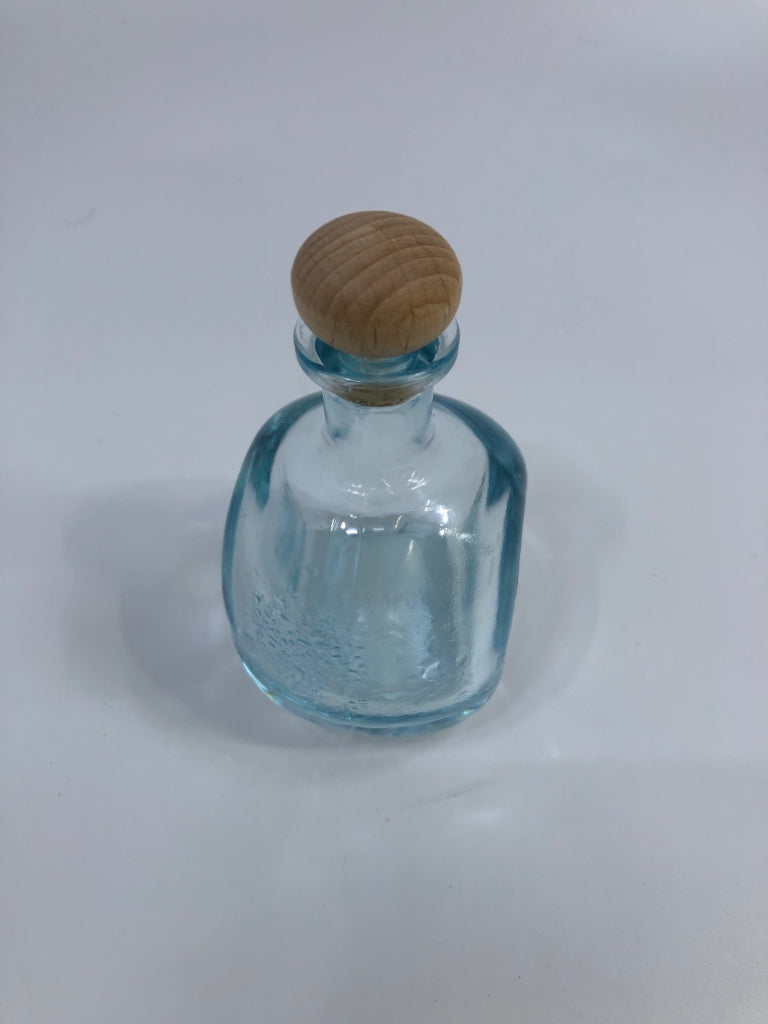 SM BLUE GLASS CONTAINER W/WOOD POP TOP.