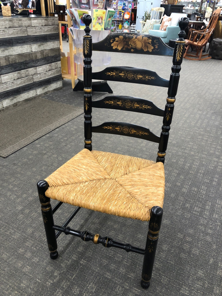 LADDER BACK CHAIR W/HARVEST PATTERN AND WOVEN SEAT.