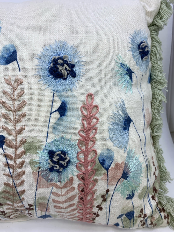 FLORAL STITCHED ACCENT PILLOW W/GREEN FRINGE.