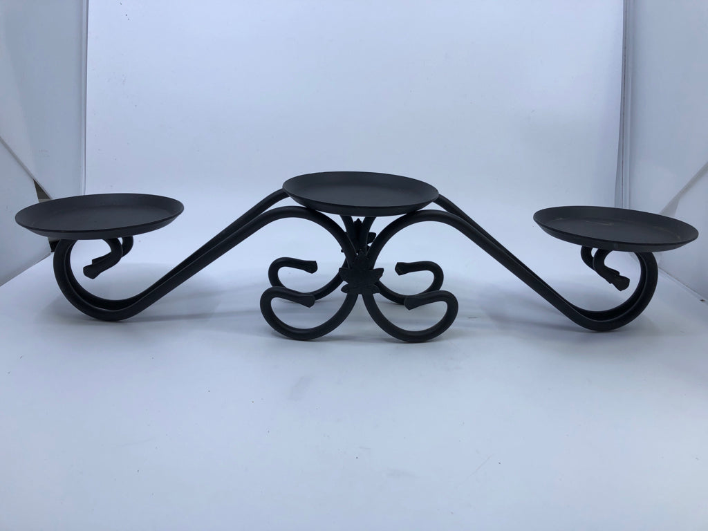 TRIPLE WROUGHT IRON CANDLE HOLDER.