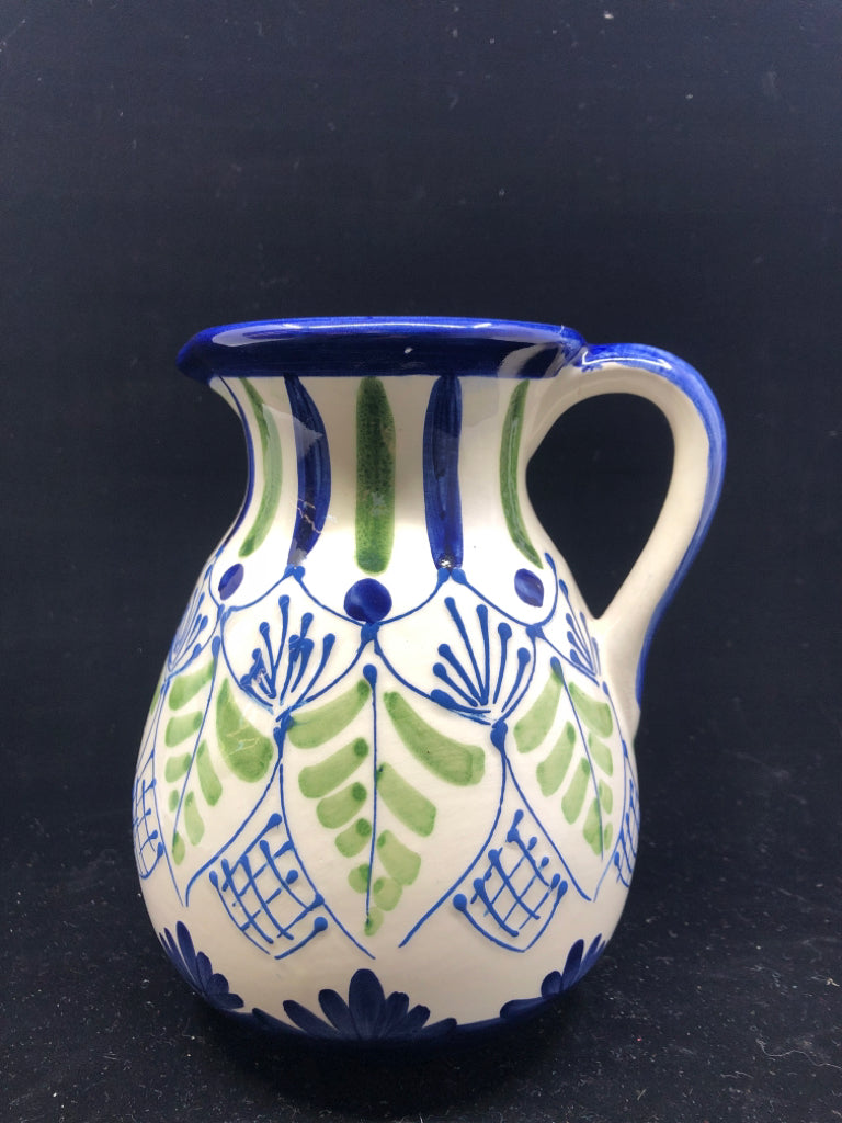 BLUE AND GREEN PAINTED PITCHER.