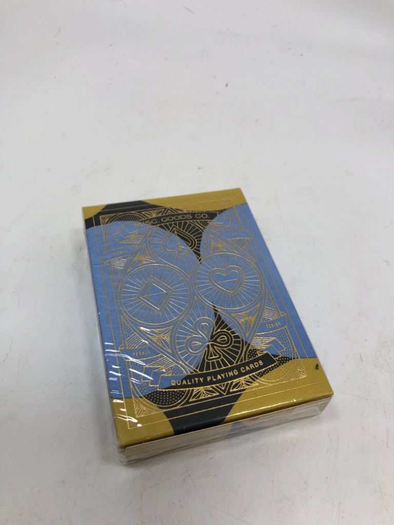 NIP BLUE/GOLD PLAYING CARD DECK.