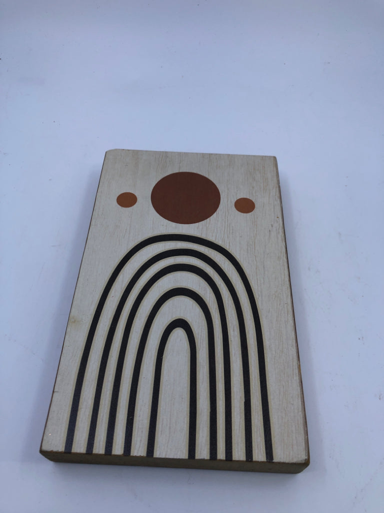 WOOD BLOCK SIGN W/ORANGE CIRCLES, BLACK ARCH LINES.
