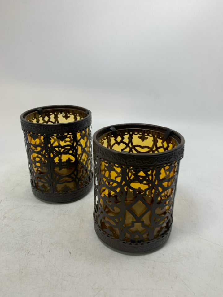 2 YELLOW GLASS W/ PIERCED BROWN CAGE TEALIGHT HOLDERs.