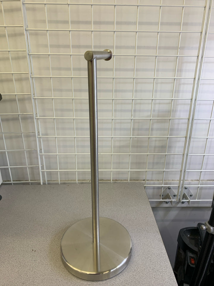 SILVER METAL STANDING TOILET PAPER HOLDER.