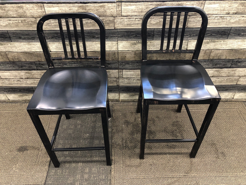 2 BLACK METAL DISTRESSED LOW BACK STOOLS.