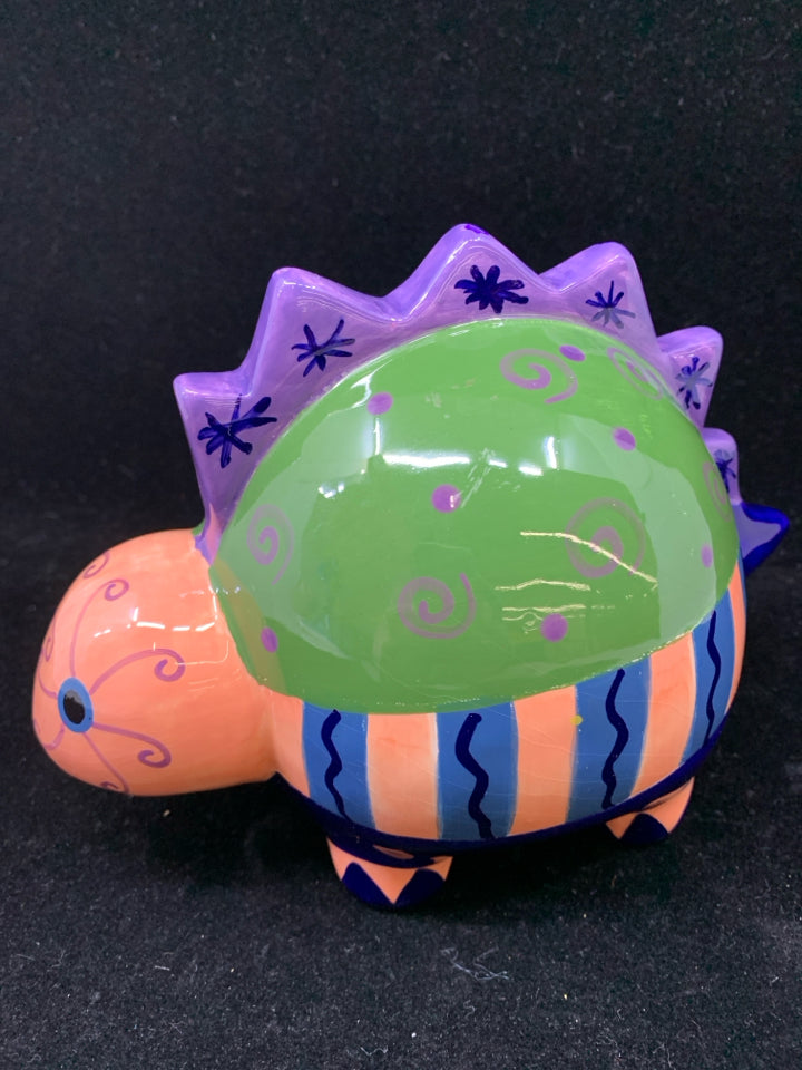 COLORFUL PAINTED DINOSAUR BANK.