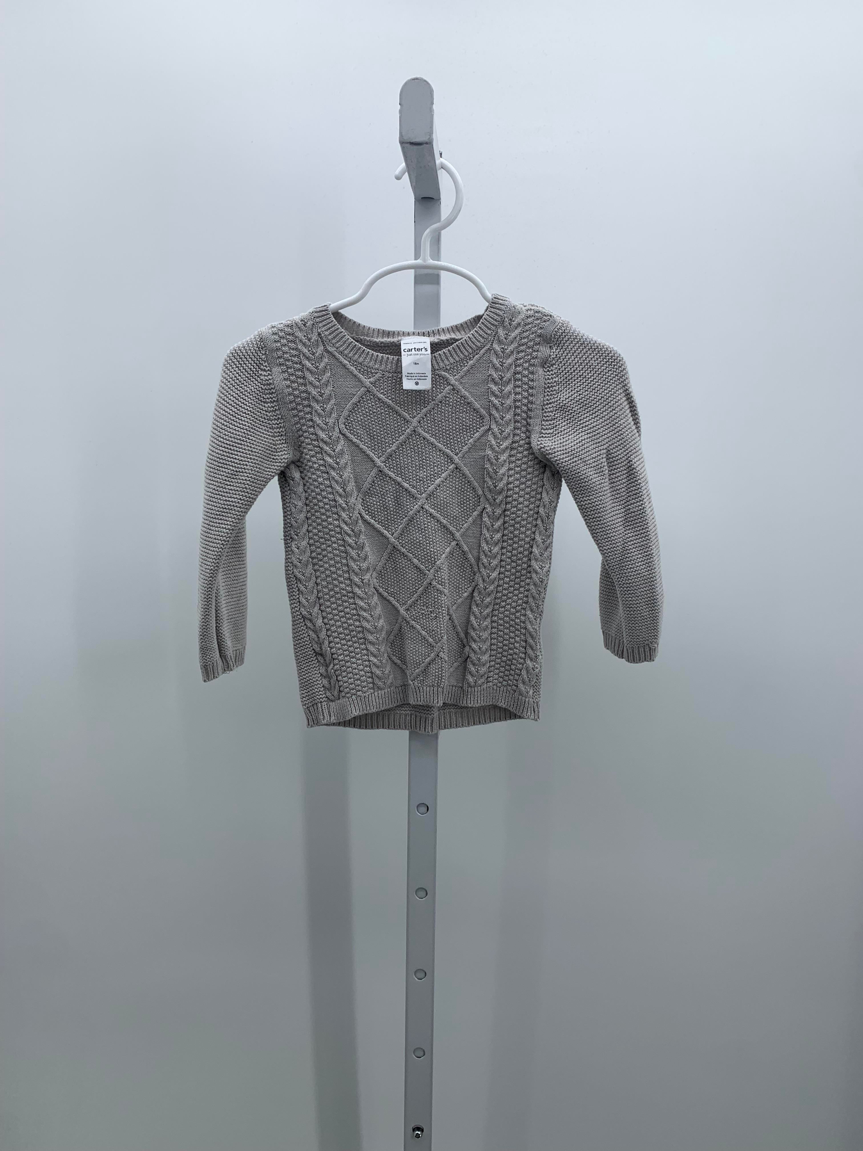 CABLED SWEATER