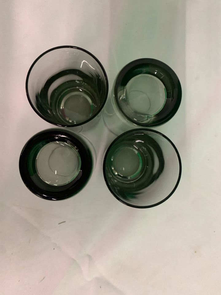 4 SMALL DARK JUICE GLASSES.
