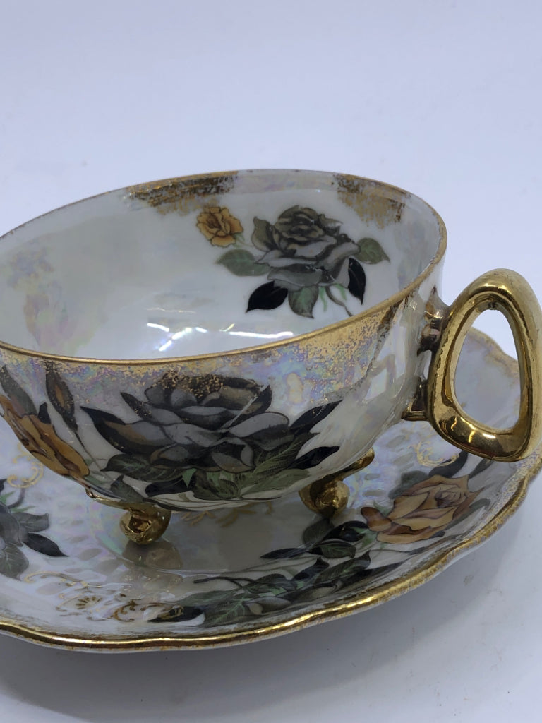 GOLD/GREY IRIDESCENT FLORAL TEACUP AND SAUCER.
