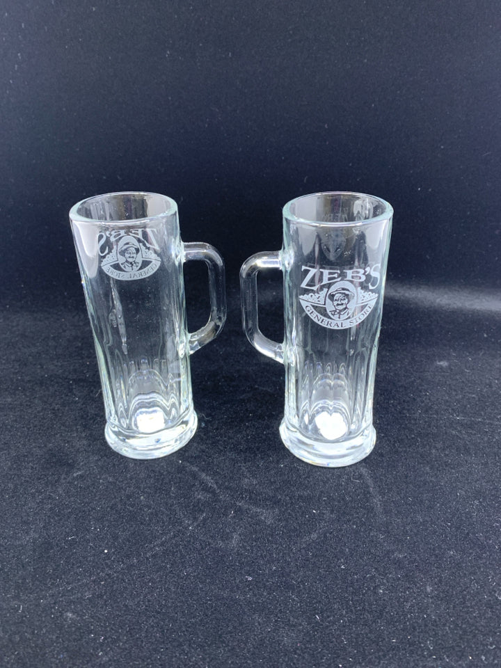 2 ZEB'S SHORT GLASSES W HANDLES.