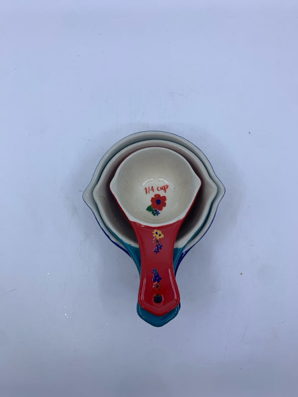 3PC CERAMIC PIONEER WOMAN MEASURING CUPS.